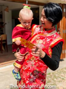 baby receiving lai see money during chinese new year | Chinese New Year 2018 | This Indulgent Life | lunar new year | hong kong expat | expat life | village life