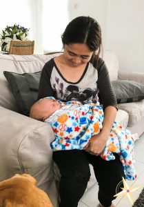 meet our domestic helper Theresa-meeting baby for the first time while dog looks on
