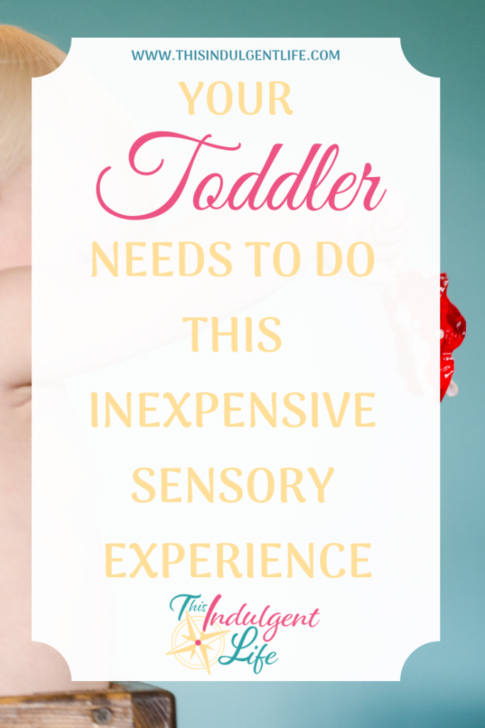 Your Toddler Needs to do This Inexpensive Sensory Experience | This Indulgent Life | This is an easy, cheap, and fun activity with many benefits for your toddler's development. | #jello #sensoryplay #sensorybins #sensoryactivitiestoddlers #toddleractivities #toddlerplay #toddlerlearning #benefitsofsensoryplay #toddlerdevelopment #sensorytoddlers